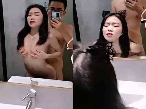 Young couple standing in front of the mirror fucking each other Young couple standing in front of the mirror fucking each other
