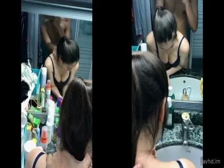 Doggy girl in front of the mirror